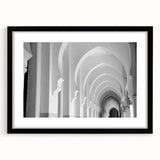Extra large abstract art print featuring colorful textured arches on a black framed canvas, ideal for living room decor.