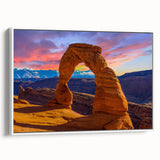 Framed canvas of a vintage poster featuring colorful landscape art paintings with black wall art accents.