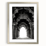 Textured art of abstract arches in muted earth tones, framed in silver, suitable for bedroom decor.