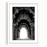 Abstract art print featuring textured arches in neutral tones, framed in white.