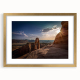 Abstract art print featuring geometric arches in muted gold and white tones on a framed canvas.