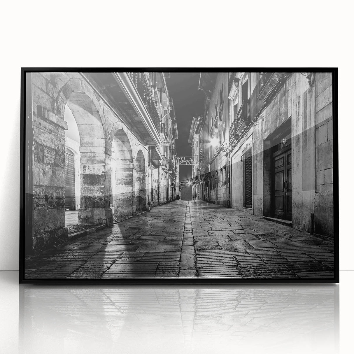 Large abstract wall art featuring black and white arches in a mid-century modernist style, framed in black acrylic.