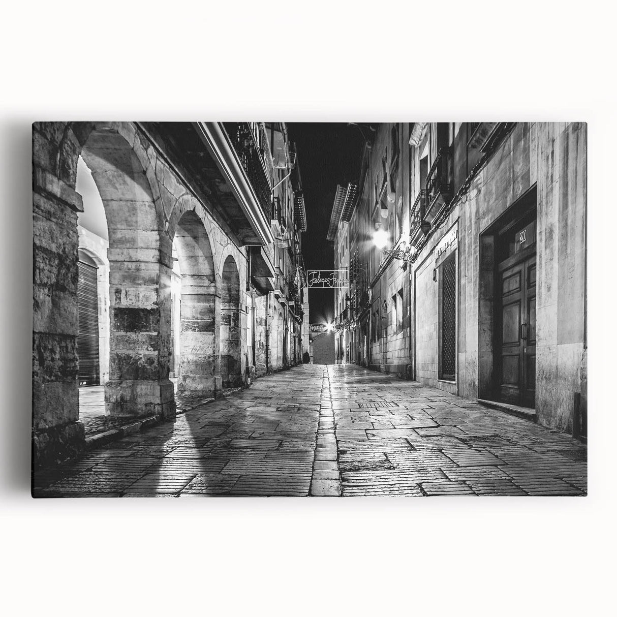 Black and white photo of architectural arches on stretched canvas, suitable for kitchen wall art.