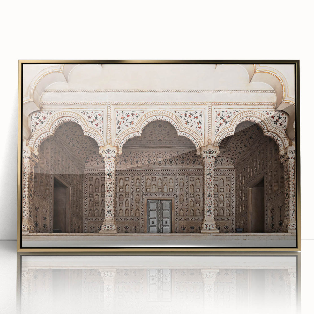 Mid-century modernist art featuring symmetrical arch designs in gold and black on a framed acrylic.