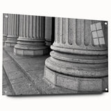 Large abstract wall art on acrylic glass featuring a series of vertical columns in muted tones.