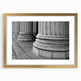 Extra large abstract art print featuring textured columns in muted gold and white, framed, ideal for living room decor.