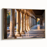 Framed canvas of vintage poster art featuring black architectural columns in a landscape format.