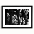Extra large abstract art print featuring colorful, textured columns, ideal for living room decor, in a black frame with mat.