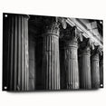 Side view of large abstract wall art featuring architectural columns in muted gray tones on acrylic glass.