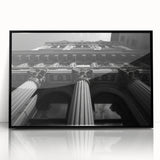 Large abstract wall art featuring black and white architectural columns in a mid-century modernist style.