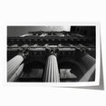 Extra large rolled print of a classical architecture design with detailed columns in muted earth tones.