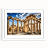 Abstract art print showing a series of white columns against a muted gray background, framed with a white mat.