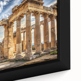 Close-up of black wall art featuring textured columns in vibrant colors on a framed canvas, ideal for living room decor.