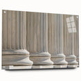 Large abstract wall art on acrylic glass showcasing a design of architectural columns in gray tones.