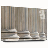 Large abstract wall art on acrylic glass showcasing a design of architectural columns in gray tones.