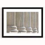 Abstract art print featuring textured, colorful patterns on a large canvas, framed in black, ideal for living room decor.