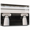 Acrylic print of large abstract wall art featuring architectural columns in muted gray.