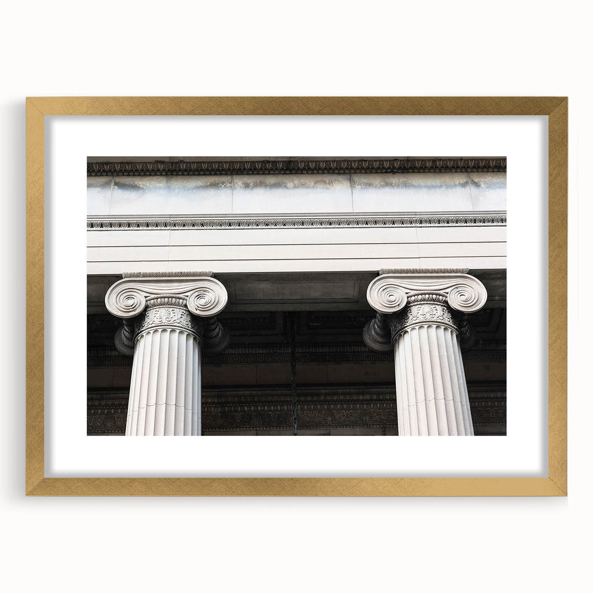 Extra large abstract art print depicting textured columns in muted gold and beige, framed, ideal for living room decor.