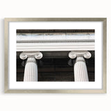 Textured abstract art print featuring overlapping columns in muted beige, framed in silver, ideal for bedroom art.