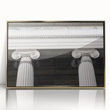 Large art print of architectural columns in gold tones on acrylic, framed, in mid-century modernist style.