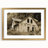 Extra large abstract art print of a textured, derelict building in muted grays and browns, framed in gold.