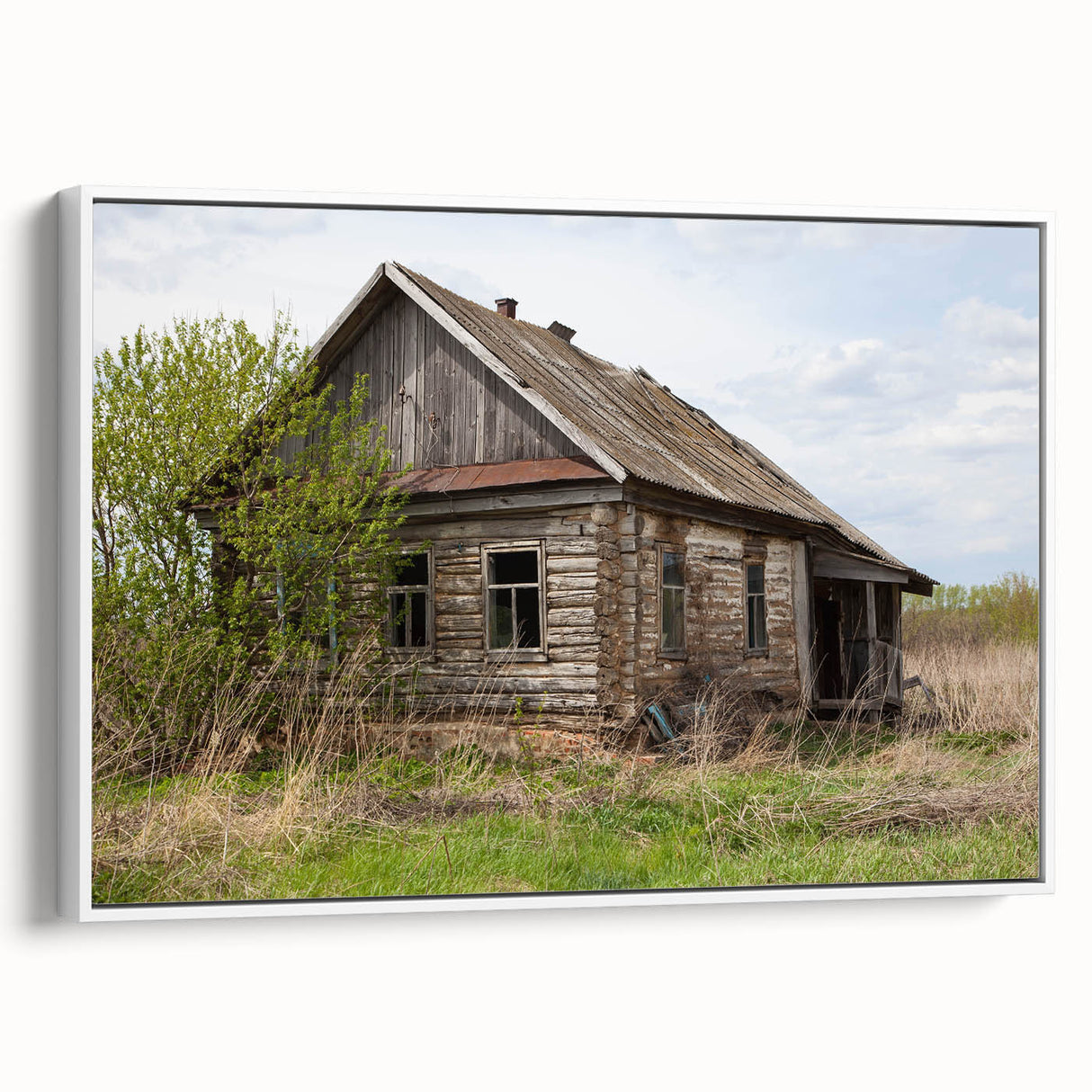 Vintage poster art of a derelict building in muted black and gray tones on a large framed canvas.