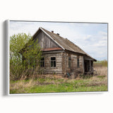 Vintage poster art of a derelict building in muted black and gray tones on a large framed canvas.
