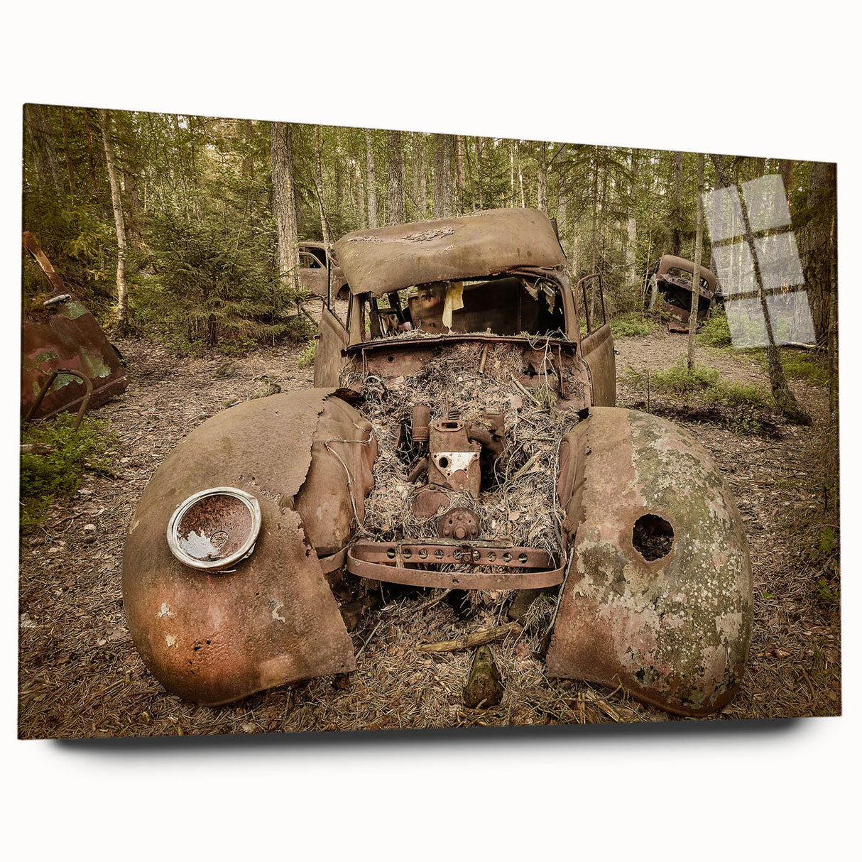 Large abstract wall art on acrylic glass depicting derelict buildings in muted gray and blue tones.