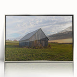 Mid-century modernist art depicting a silver-framed acrylic print of architectural dereliction.