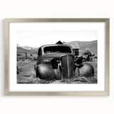 Textured abstract art print in muted grays and blues, framed in silver, ideal for bedroom art.