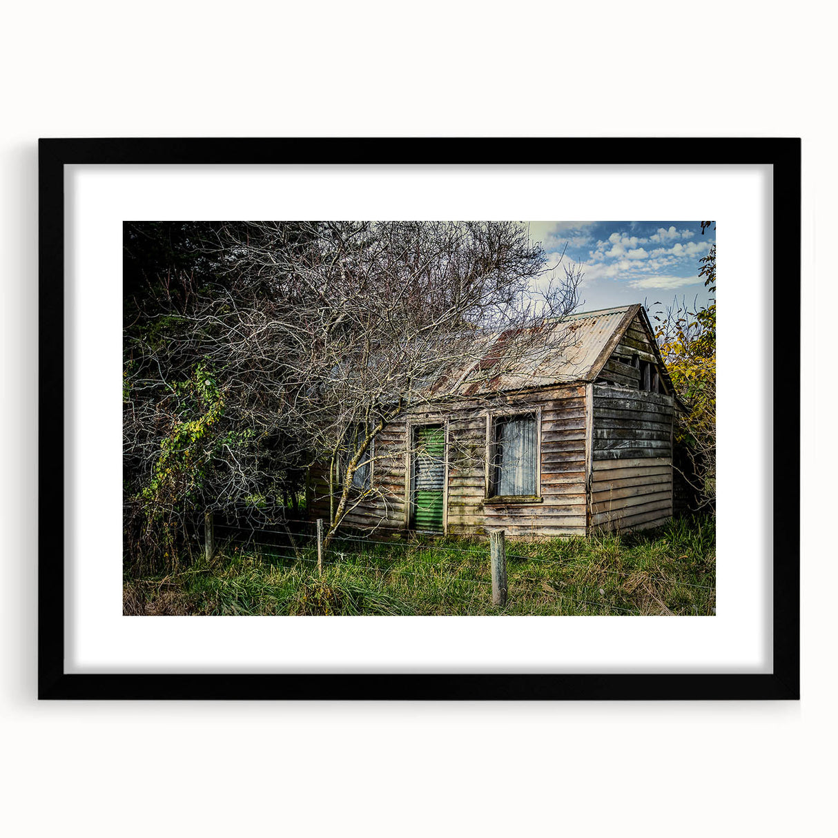 Extra large abstract art print featuring vibrant, textured colors on a framed black canvas, ideal for living room decor.