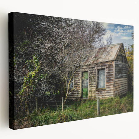 Large art print of a derelict building in muted gray tones on stretched canvas, suitable for kitchen wall art.