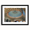 Abstract art print featuring colorful, textured domes in a large black frame, ideal for living room decor.