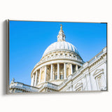 Framed canvas featuring a vintage poster art of colorful landscape paintings with black borders, ideal for office decor.