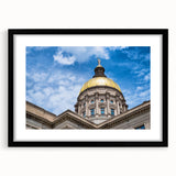 Abstract art print featuring textured, colorful domes, in a large black frame, ideal for living room decor.