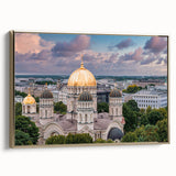 Framed canvas featuring a vintage poster art of colorful landscape with black architectural domes, ideal for office decor.