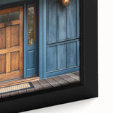 Close-up of a black framed canvas featuring a colorful, textured door design, ideal for extra large living room wall art.