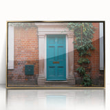 Mid-century modernist art depicting an architectural door design in gold tones on framed acrylic.
