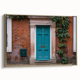 Framed canvas of a vintage-style black door against a colorful landscape, ideal for adding character to living room decor.