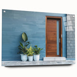Large abstract wall art on acrylic glass depicting a detailed door design in muted earth tones.