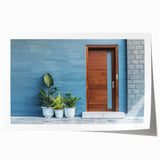 Extra large rolled print of a detailed floral design on a door, in muted earth tones, ideal for dining room wall art.