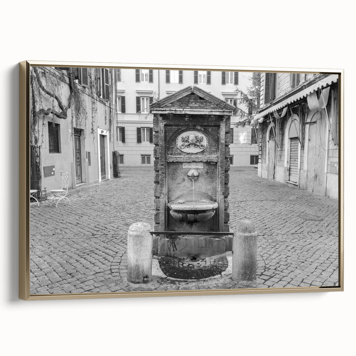 Framed canvas of a vintage-style black landscape painting featuring an architectural fountain design.