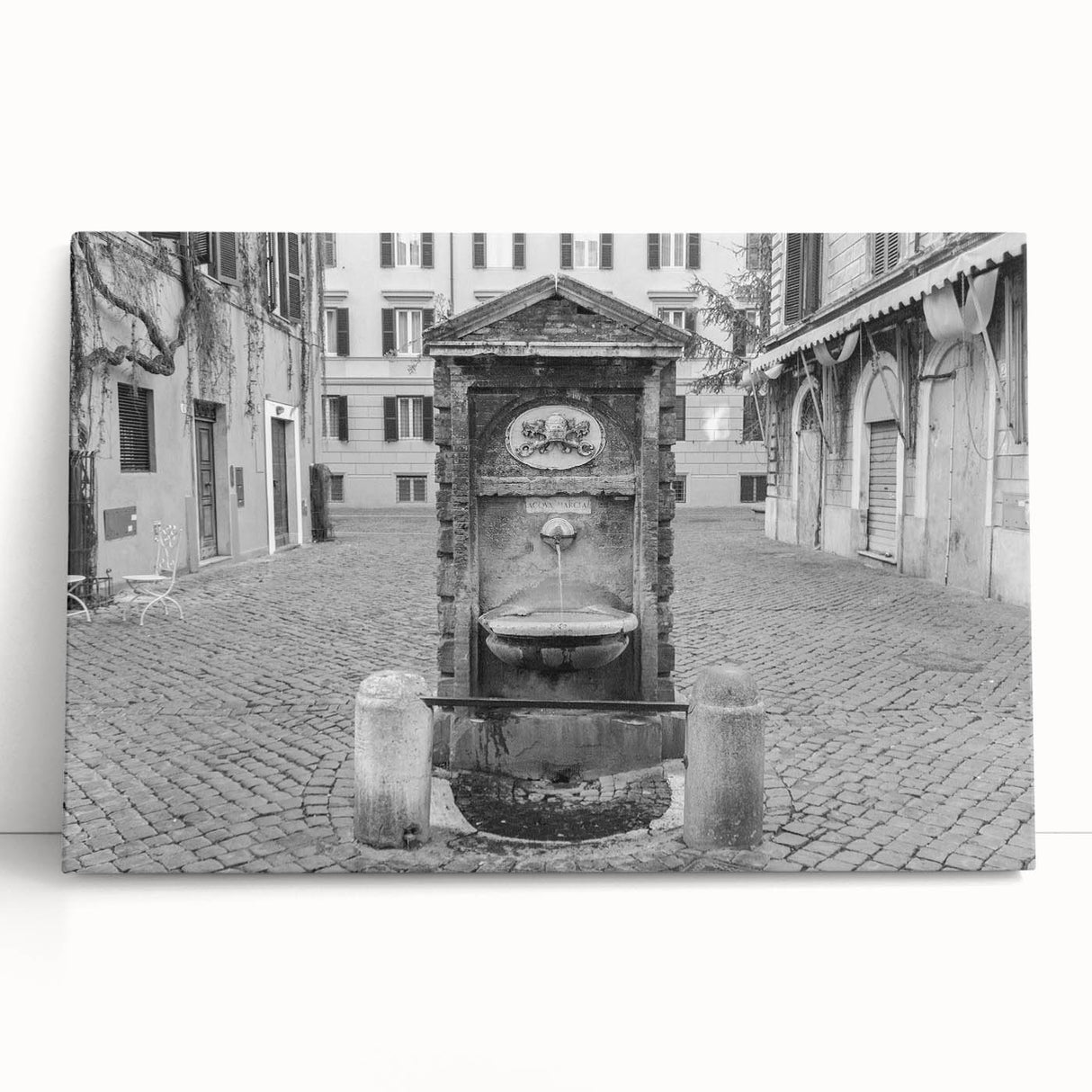 Black and white photo of an architectural fountain design on stretched canvas.