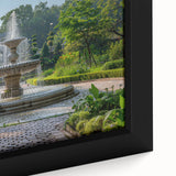 Black wall art featuring a textured fountain design with colorful accents on a framed canvas, ideal for living room decor.
