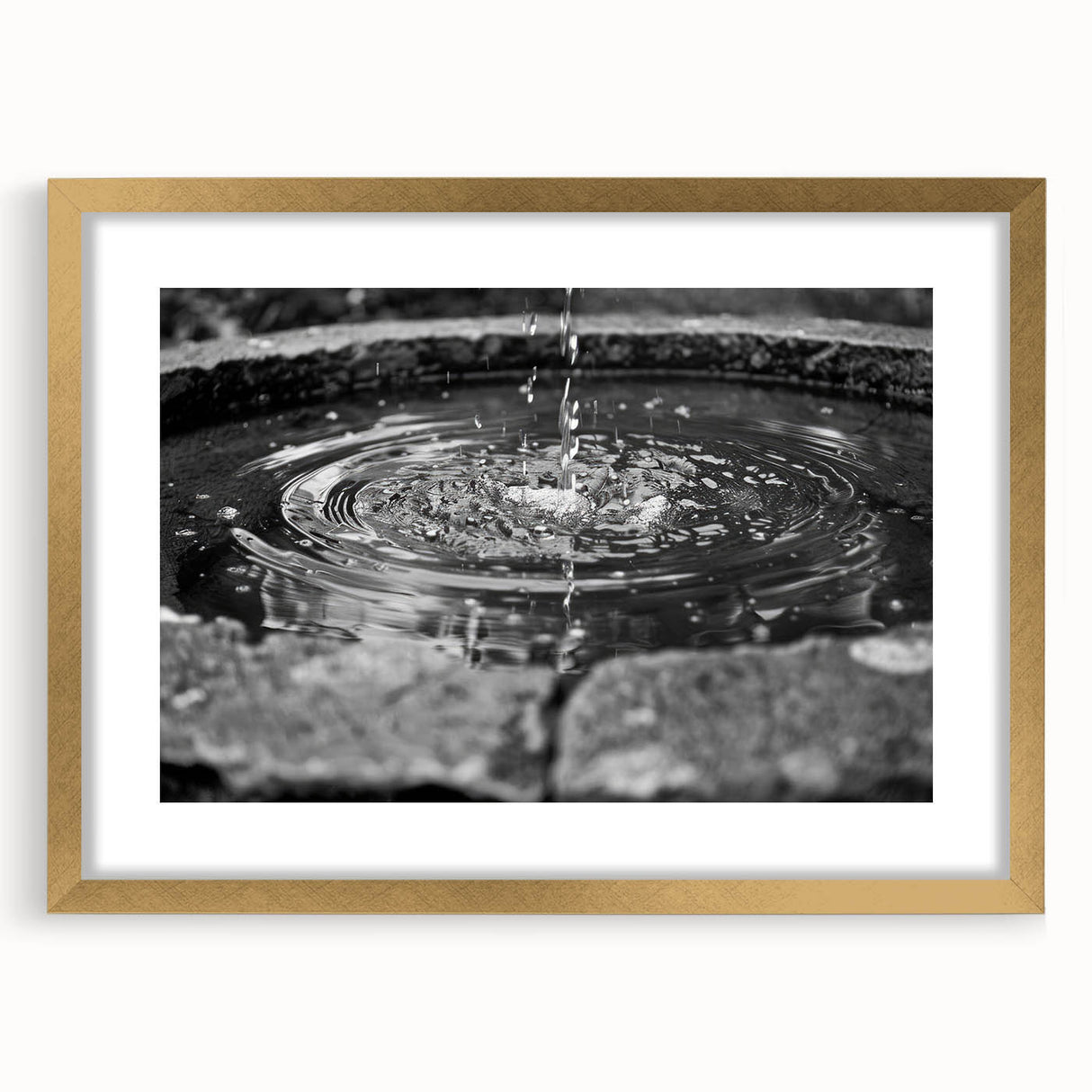 Extra large abstract art print of a textured fountain design in gold tones, framed with mat, ideal for living room decor.