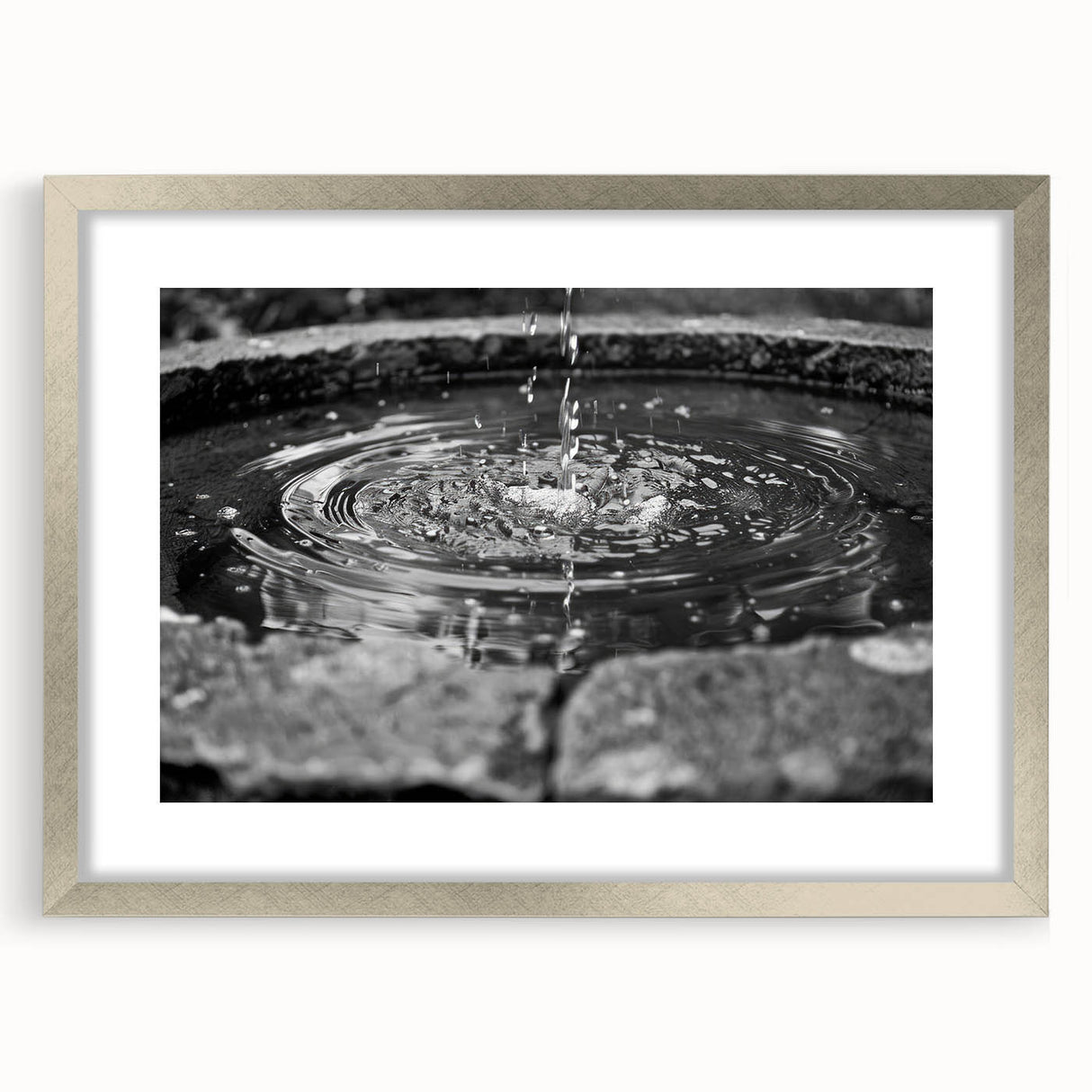 Textured art print featuring abstract design in muted gray and blue tones, framed in silver, ideal for bedroom art.