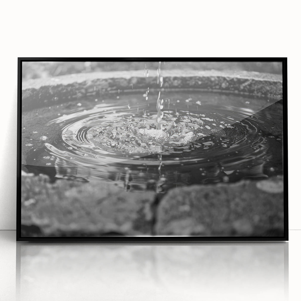 Large abstract wall art featuring a geometric fountain design in black and white tones, framed acrylic.