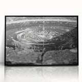 Large abstract wall art featuring a geometric fountain design in black and white tones, framed acrylic.