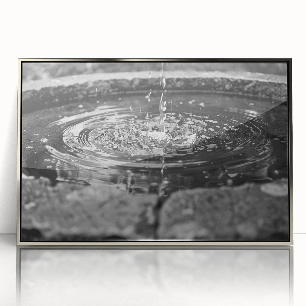 Mid-century modernist art of a silver framed acrylic print depicting an architectural fountain design in muted tones.