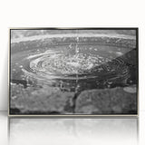 Mid-century modernist art of a silver framed acrylic print depicting an architectural fountain design in muted tones.